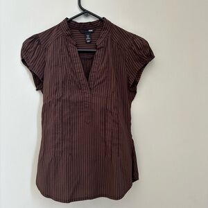 H&M size 6 but fits like an XS v-neck work short sleeved shirt